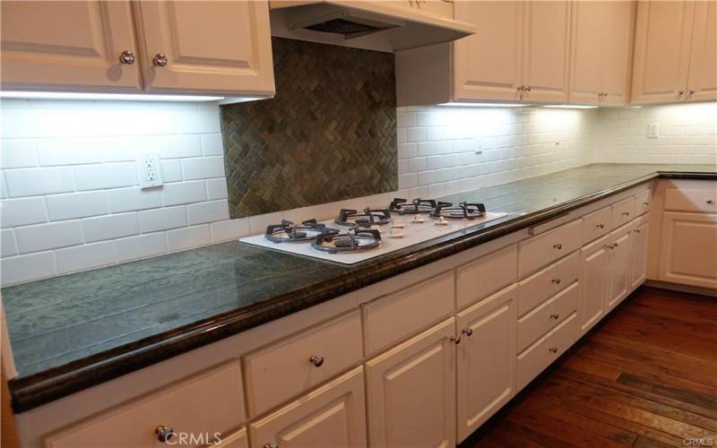 Granite counter top with 5 stove burner