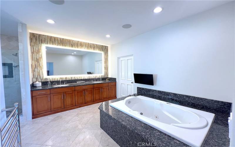 Primary bathroom with soaking tub.