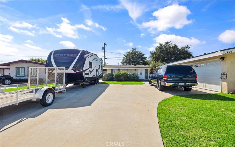 RV PARKING ON LEFT, DRIVEWAY and 2_CAR GARAGE ON RIGHT