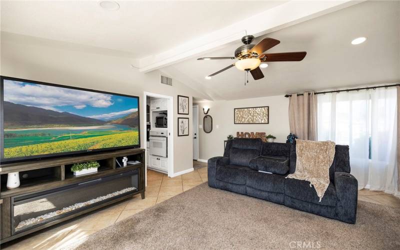 LIVING ROOM HAS POCKET DOOR TO KITCHEN