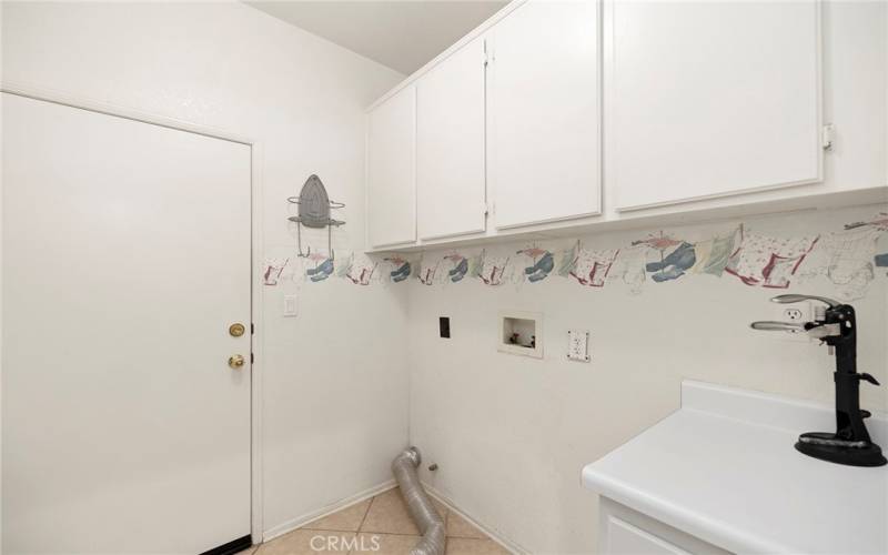 Indoor laundry room with gas & electric hook-ups