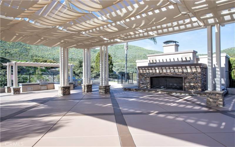 BBQ/party area set against a lovely mountain backdrop.