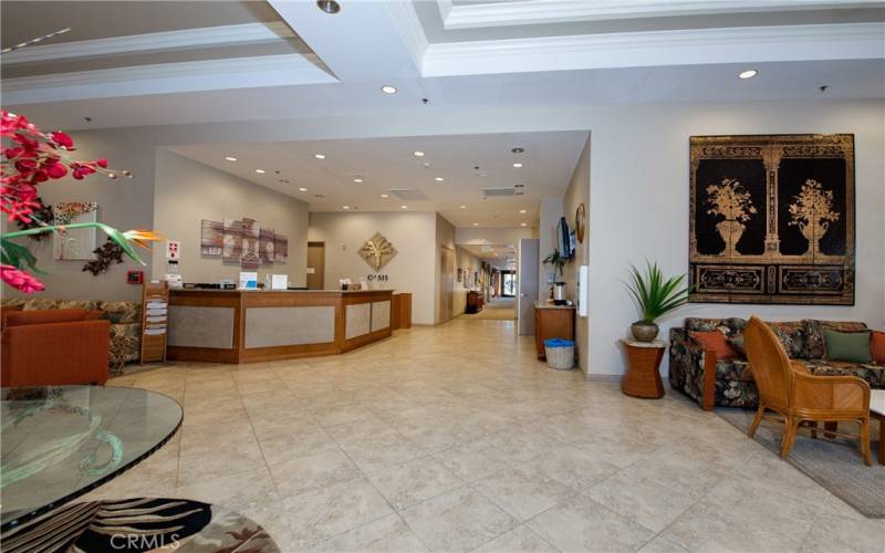 Lobby looking towards the media/card room, fitness center, multi-purpose rooms, library, computer center and billiard parlor.