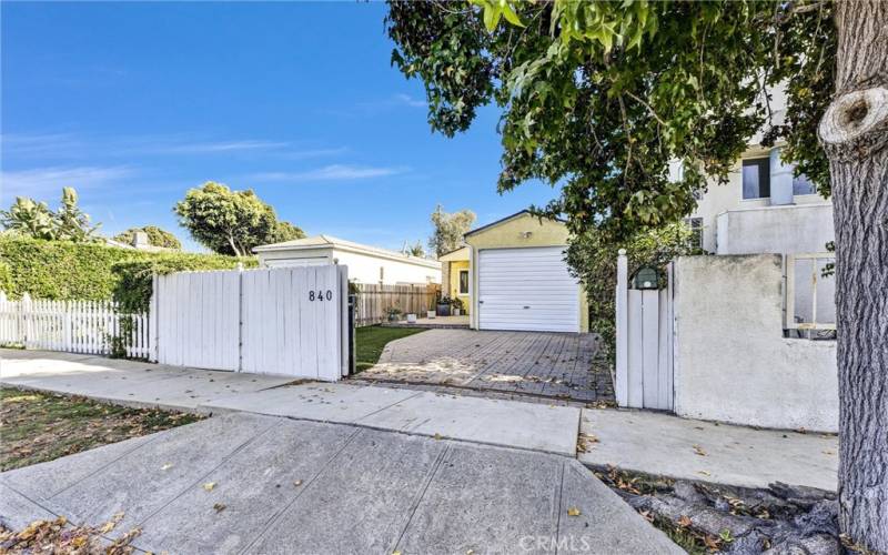 Front entry street view with roll up gate