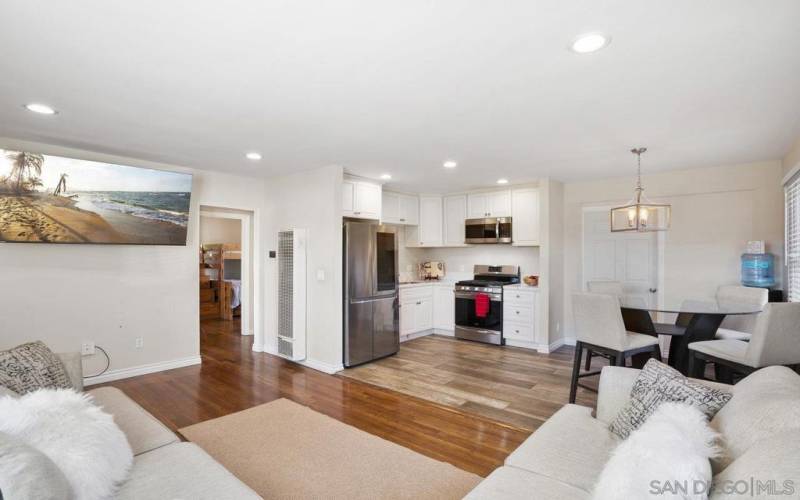 Living Area leads to Hallway with 2 Bedrooms and 1 Bathroom