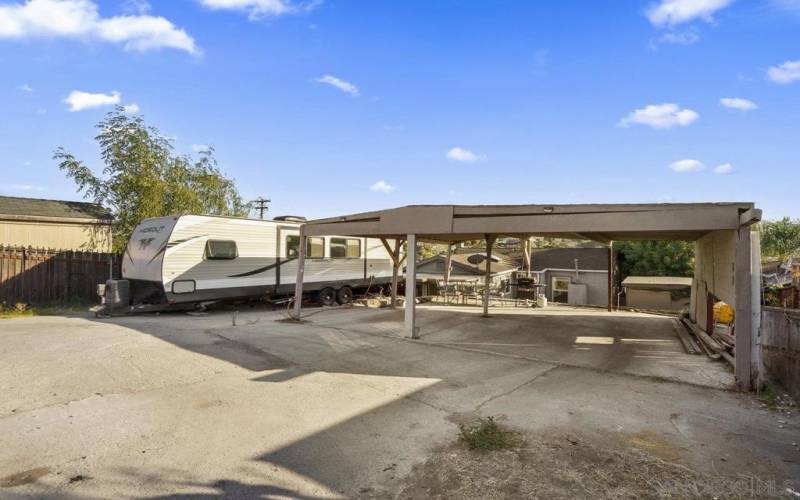 Rear yard is spacious with plenty of parking, RV parking with hookups and views!