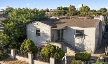 Home sits high above the street for great views and privacy