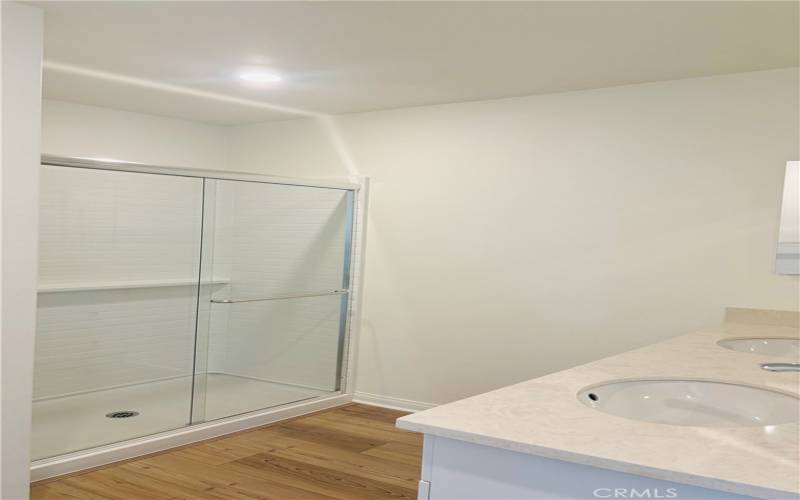 large walk in shower in the master bedroom