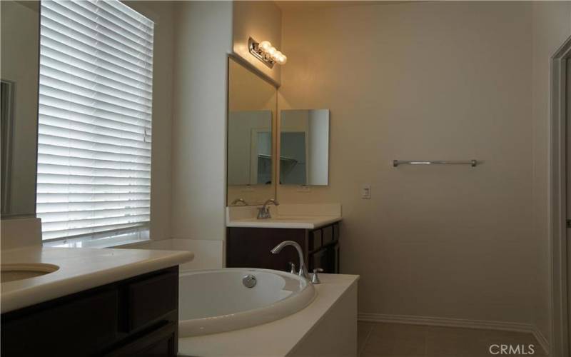 MASTER BATH W/DUAL SINKS, SOAKING TUB, TILE FLOORS