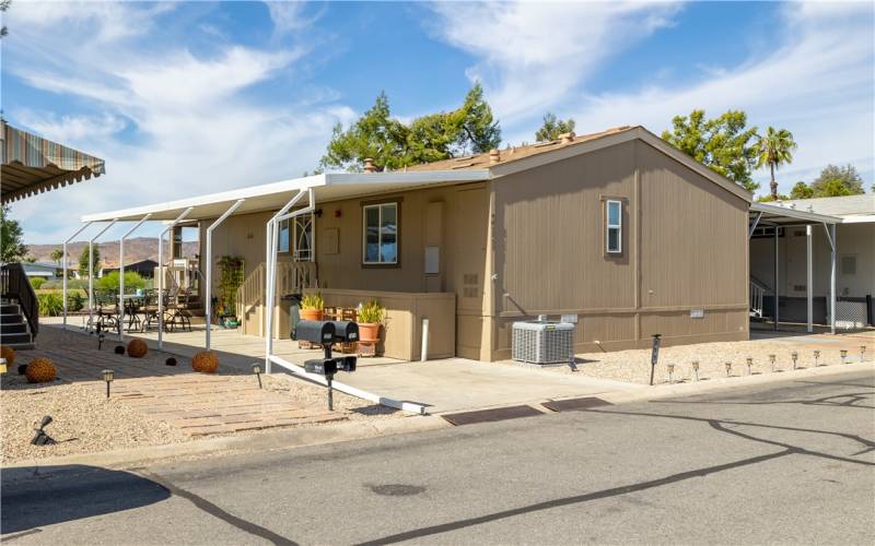 Street view, patio and Golf Cart side on the left