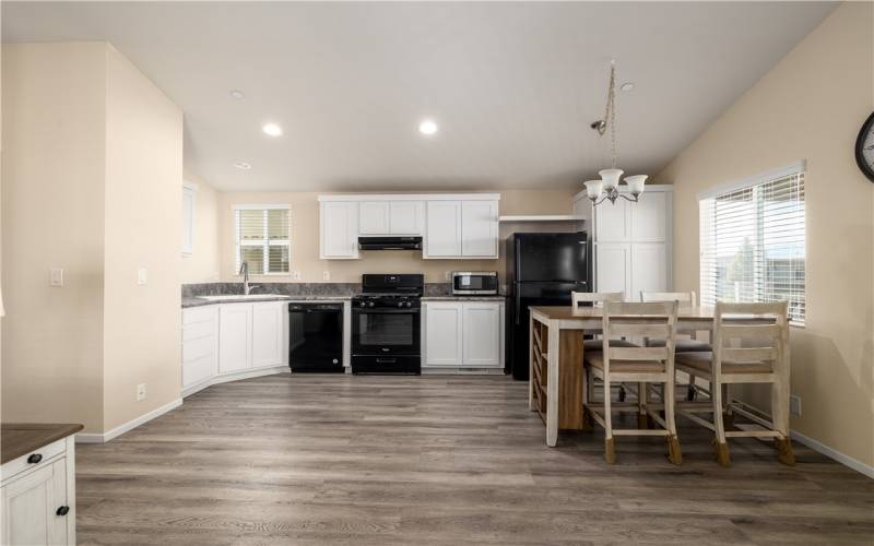 Kitchen with recessed lights and breakfast nook area