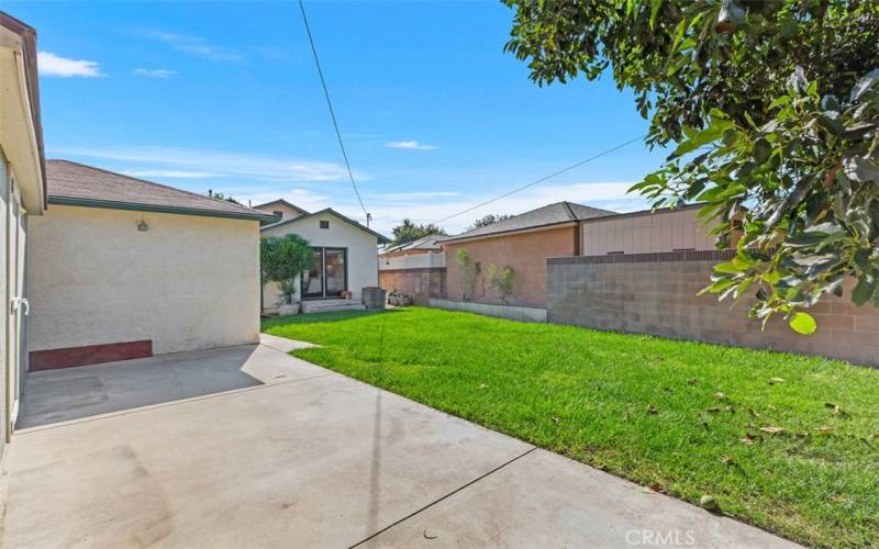 Backyard with 2 Car Garage and additional large storage shed all behind a private gate fence