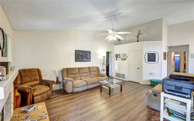 Living room - heavy luxury vinyl flooring installed in 2023.