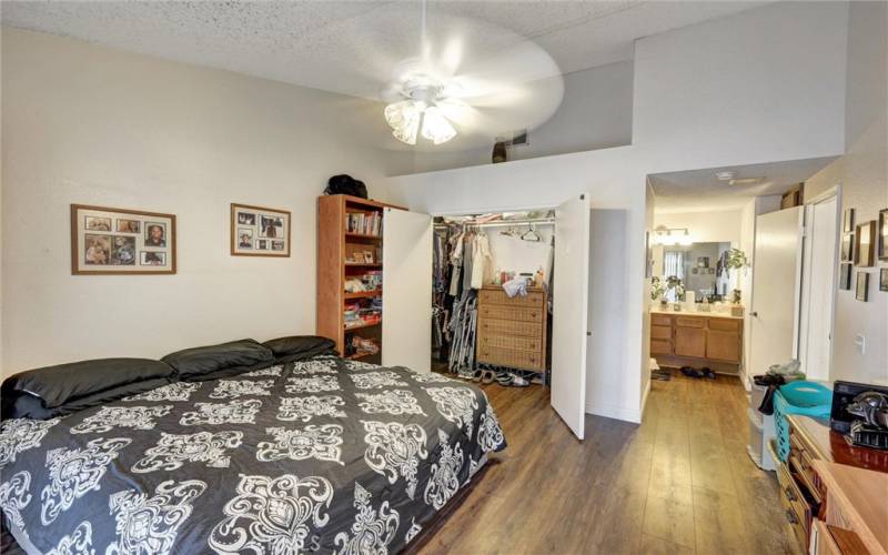 Large walk-in closet in primary bedroom.