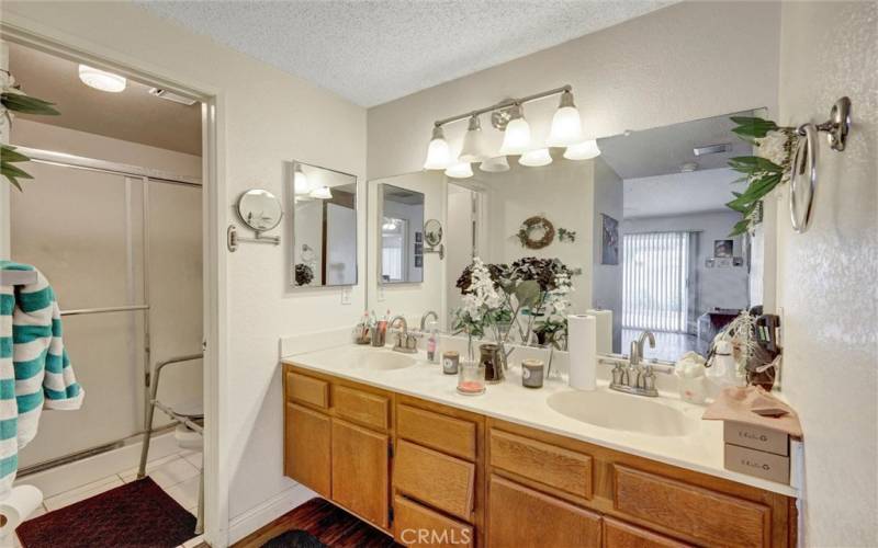 Primary bathroom with dual sinks.