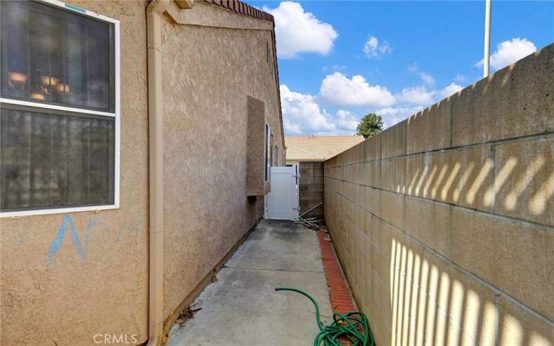 Side yard, looking towards front.