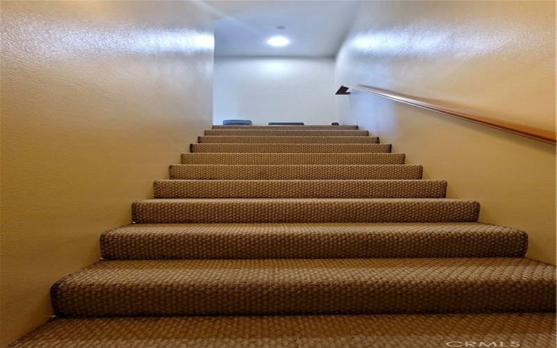 Staircase to garage for easy access and convenience.