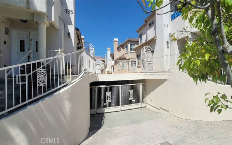 Entry and exit for underground parking and to each unit garages