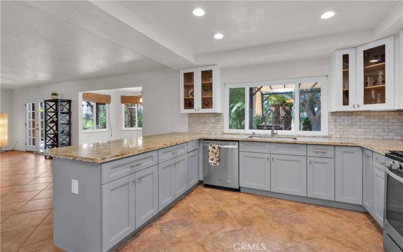 KITCHEN OPENS TO FAMILY ROOM