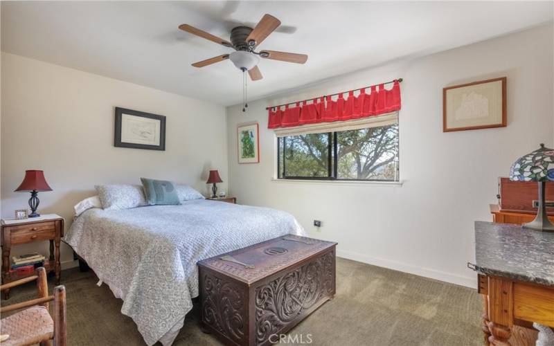 Large 2nd guest bedroom with ceiling fan.