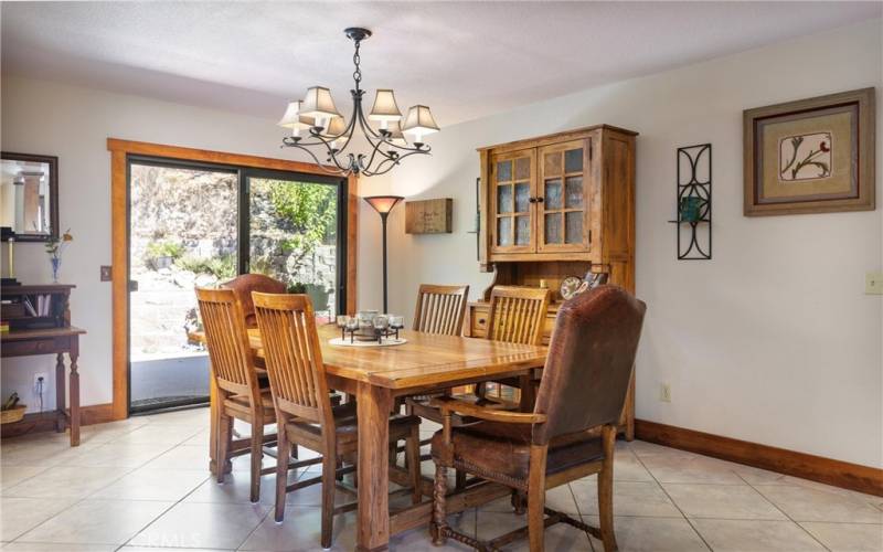 Wood trim & baseboards with sliding glass door to back patio.