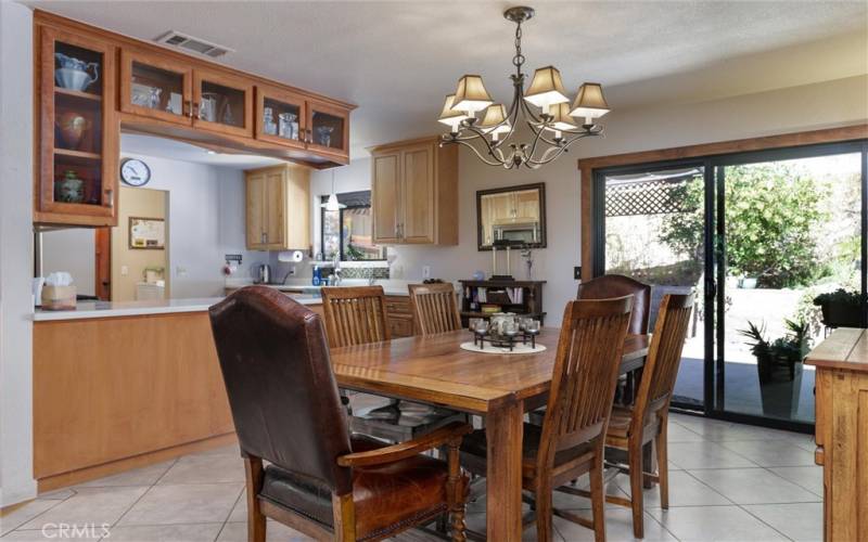 Dining area with Travertine Tile flooring.