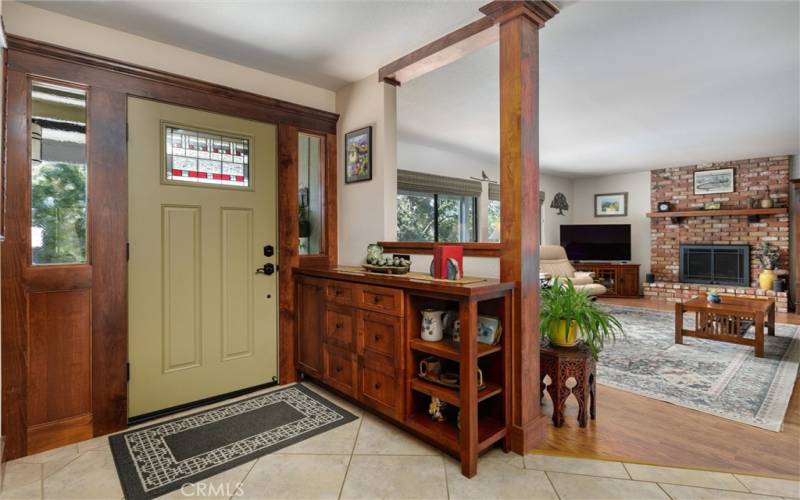 Custom Alder entry cabinets & door trim.