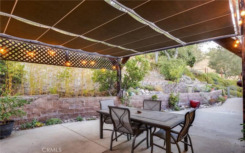 Covered patio with removable canvas cover.