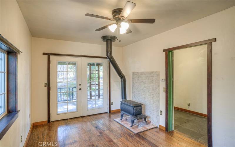 Guest Bedroom with own set of access doors and woodstove