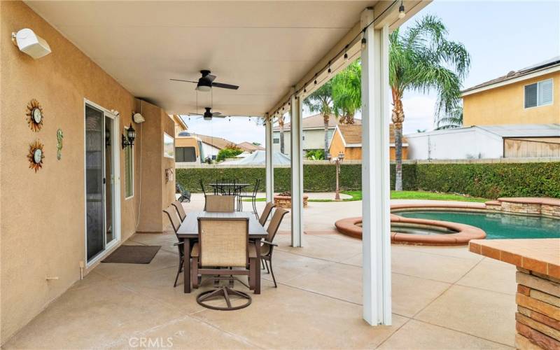 Patio cover with ceiling fans & bistro lights