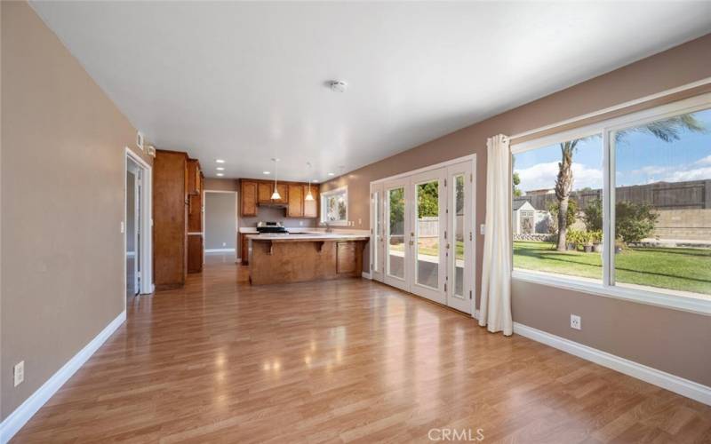 LOOKING INTO KITCHEN FROM FAMILY