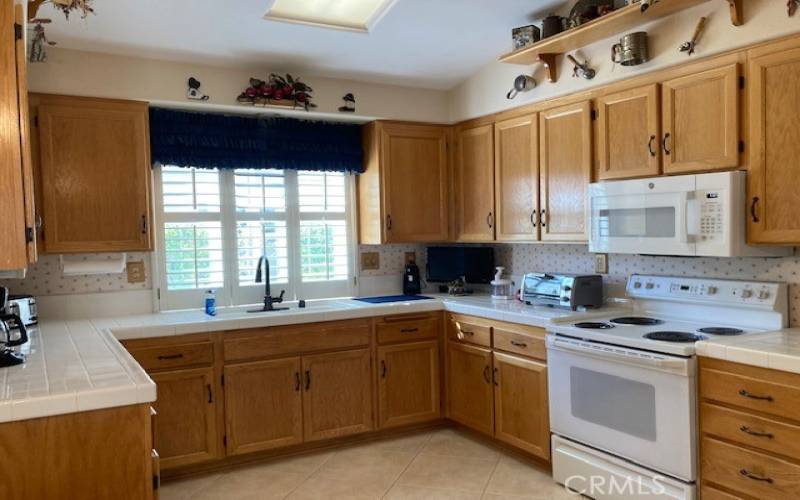 Kitchen with lots of cabinets.