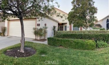 Beatuiful single-story home.  HOA waters & maintains all front landscaping.