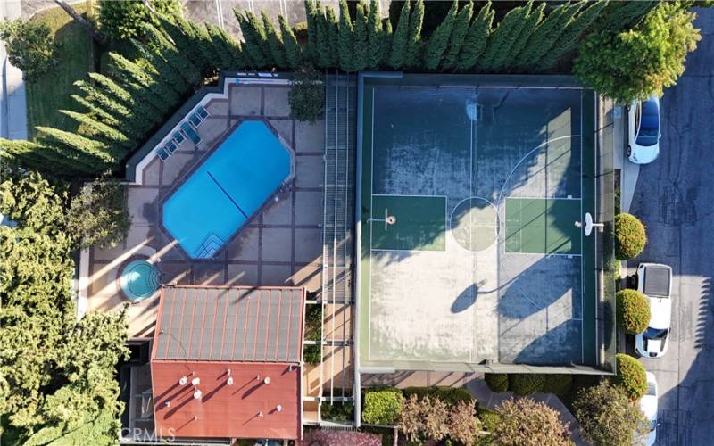 Drone Photo of Pool, Jazuzzi and Sports Court