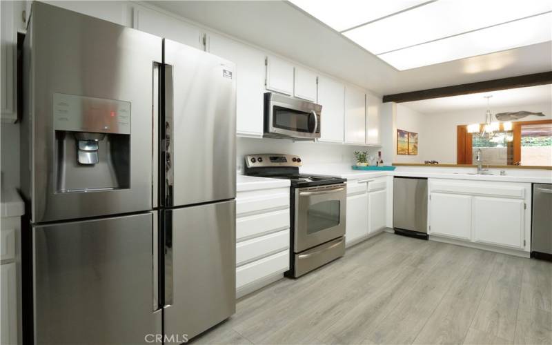 Kitchen Includes a LG Hybrid Refrigerator