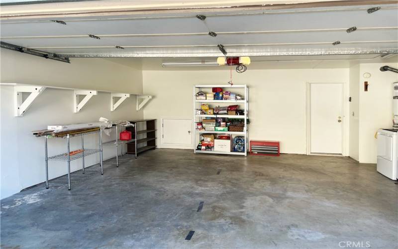 Newly Painted Garage Interior with Direct Access to the Home