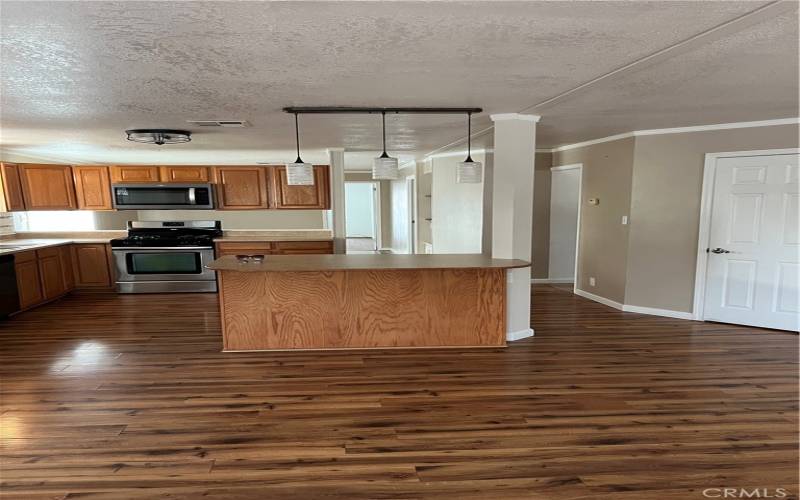 KITCHEN LOOKING INTO 

LIVING AREA