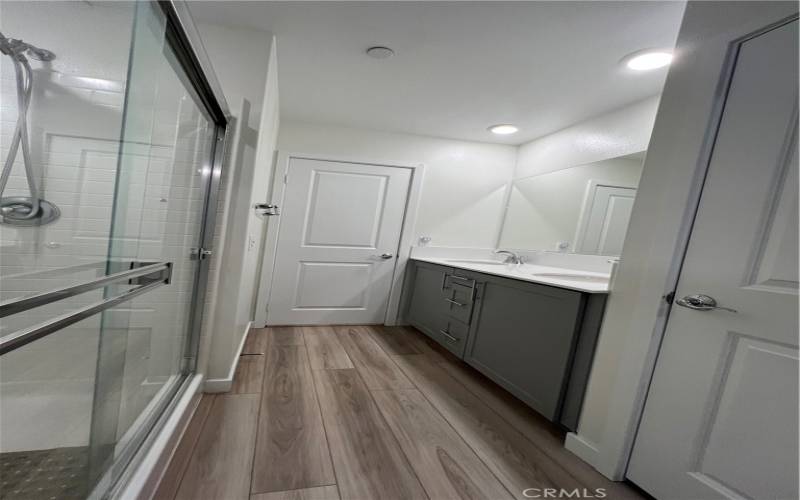 Primary bedroom with double sink.