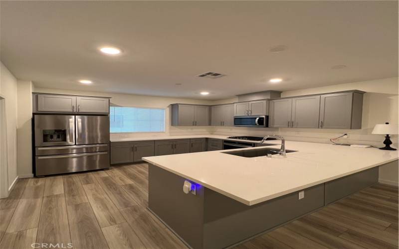 Kitchen with breakfast bar.