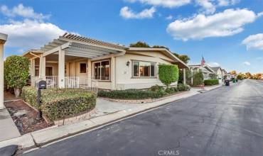 Front with large covered patio