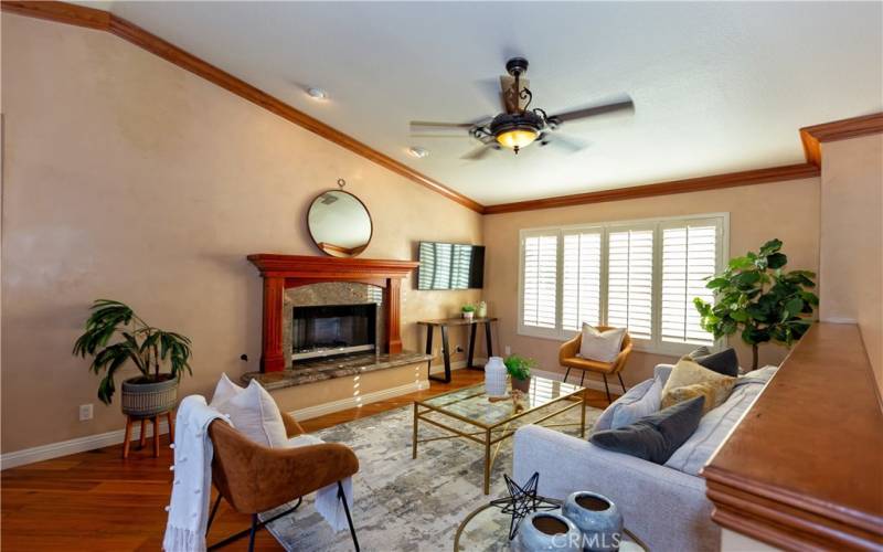 Living room with tall vaulted ceilings