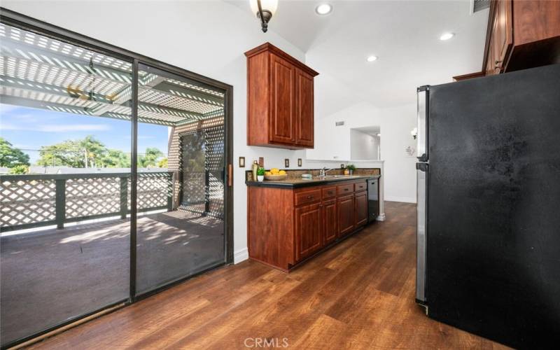 Lots of natural light pours in through the two large sliders in the kitchen and living room.