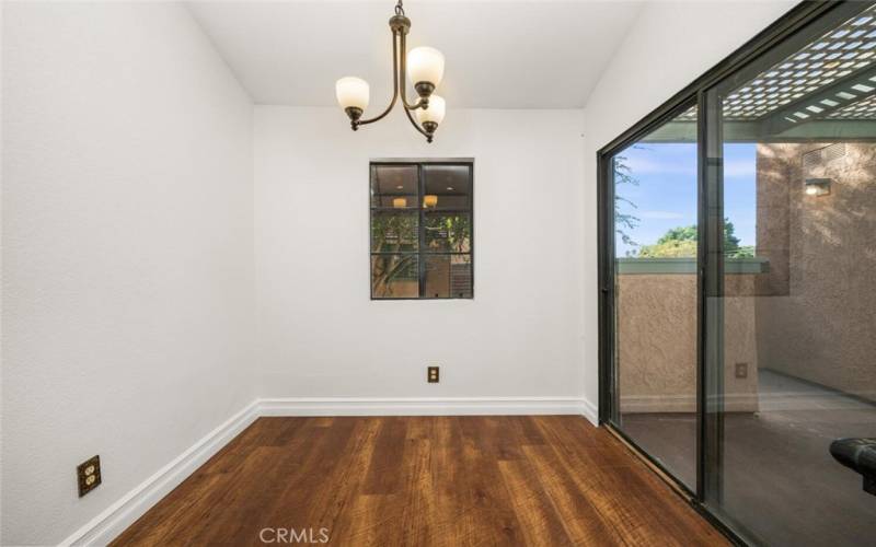 This breakfast nook at the end of the kitchen could make an ideal work from home desk areas