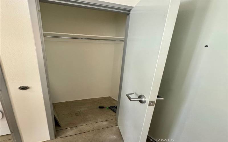 Entry closet that can be converted to a pantry.