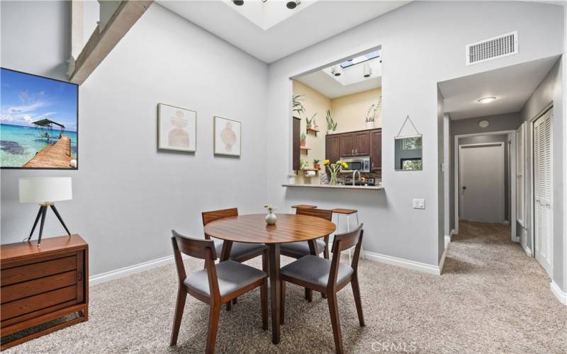 Large Dining Area and eating bar under skylights