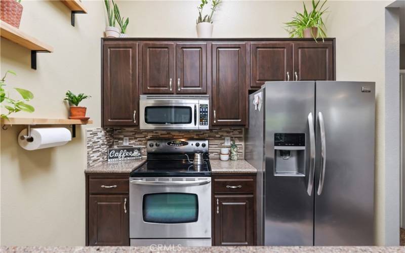 Kitchen view of appliances and skylight in kitchen