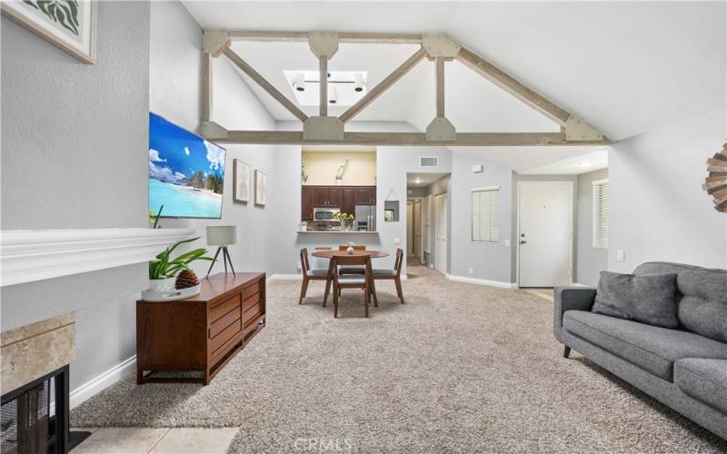 Living with High ceilings view toward dining area eating bar and kitchen