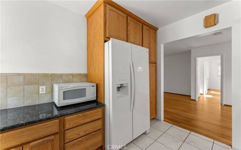 Updated kitchen includes Refrigerator and Microwave