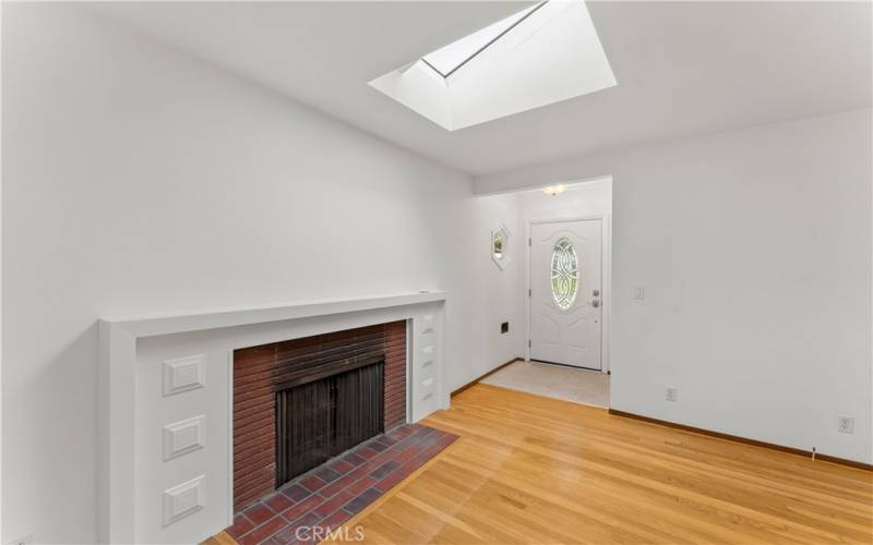 Fireplace and Skylight near front door