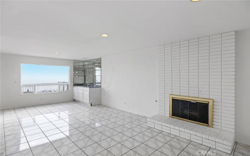 Downstairs family room with fireplace